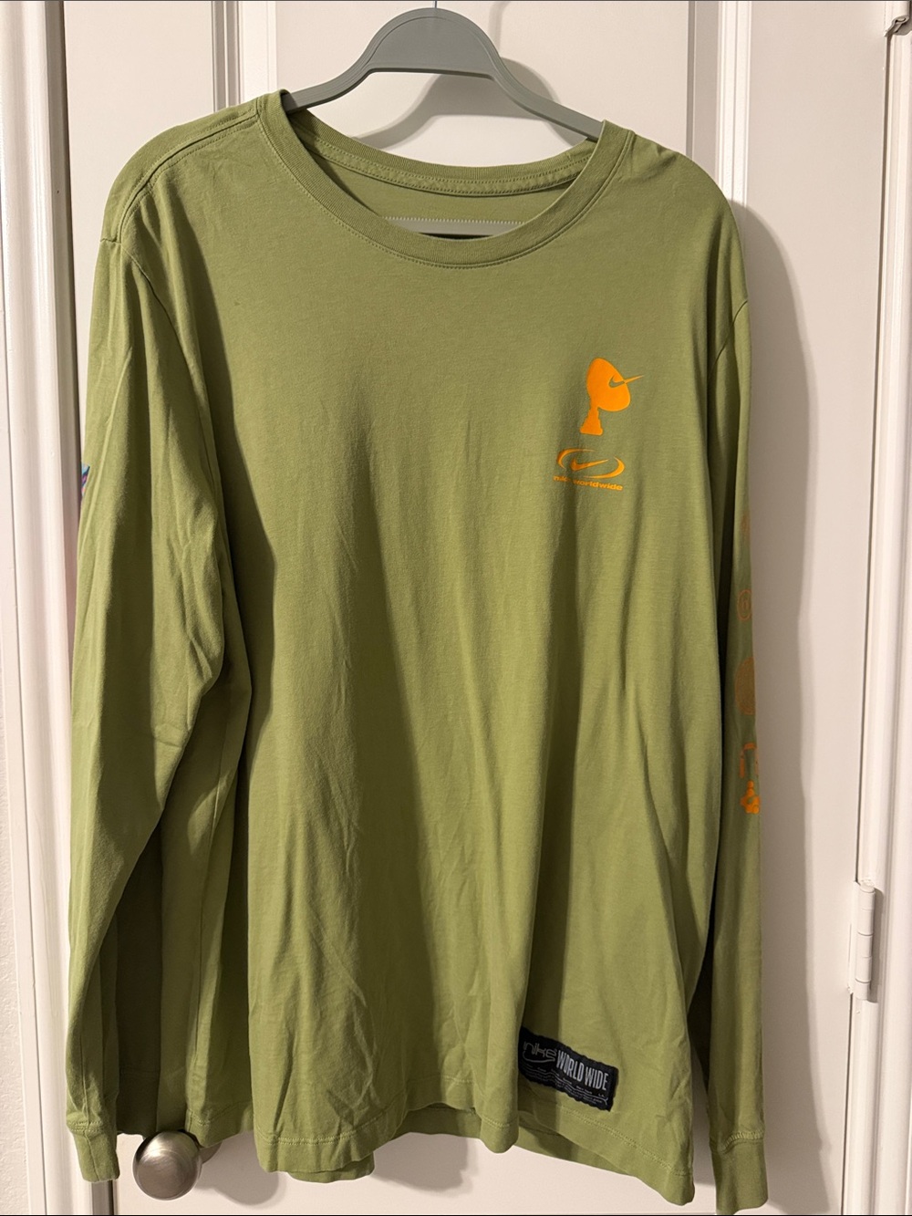 Nike Olive Green Long Sleeve Tee with Orange Chest Graphic